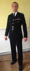 11-dai-police-inspector-fat.jpg (105061 bytes)